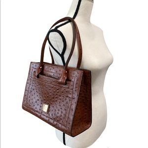 Brand New Dooney & Bourke leather purse with dust bag